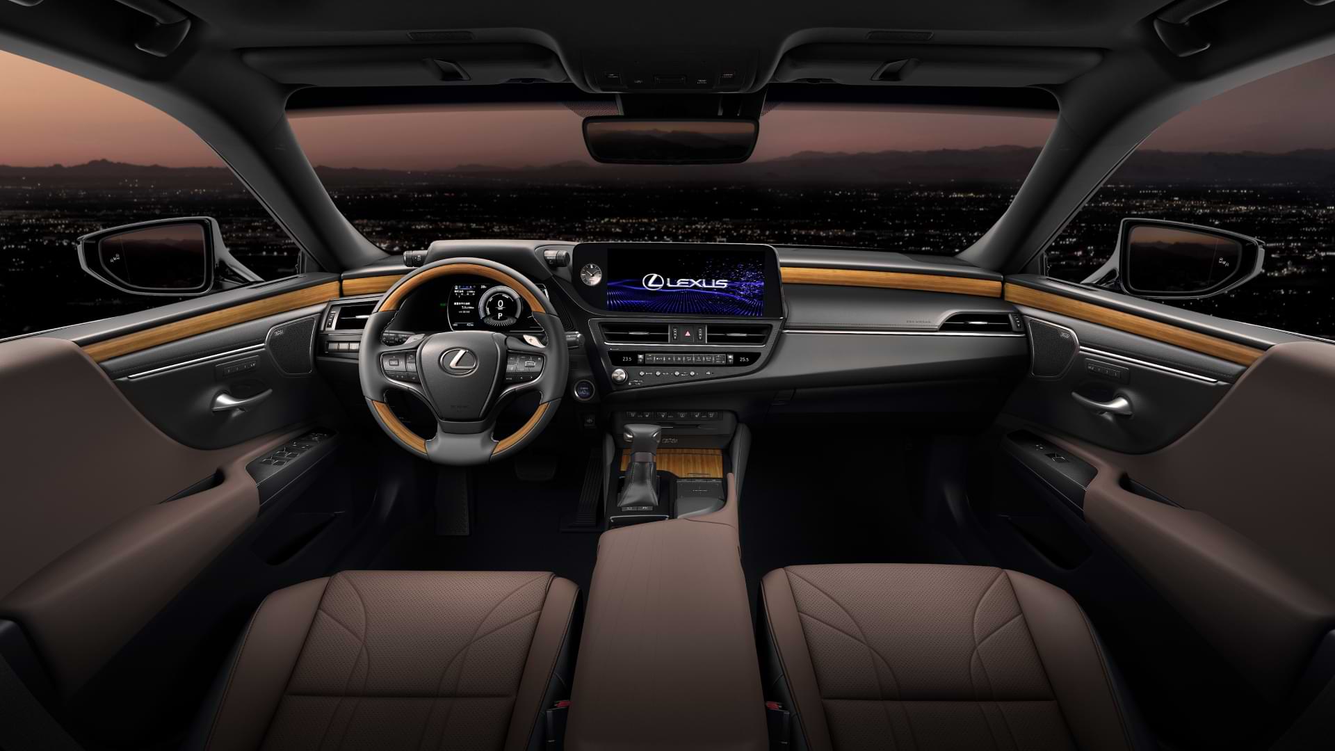 Interior view of 2021 Lexus ES steering wheel, dash and front seats.